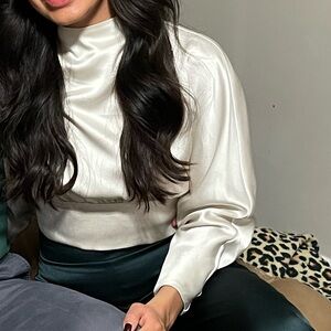 Cream colored, open back top